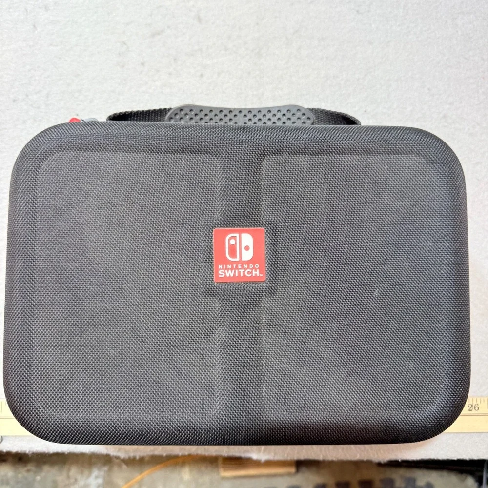 Nintendo Switch Black Hard Shell Carrying‎ Case w/ Zippered Pouch and Red accent